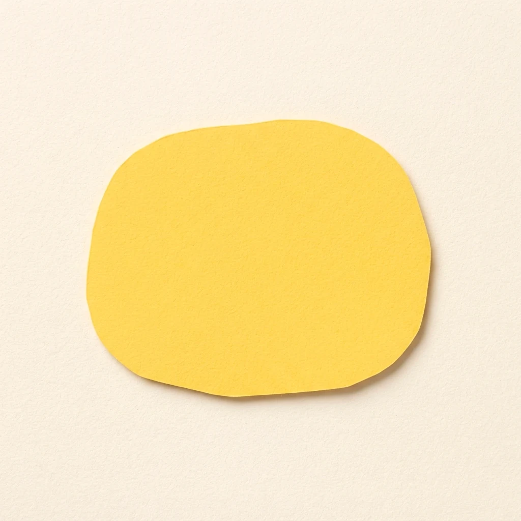 Une tache jaune en papier découpé